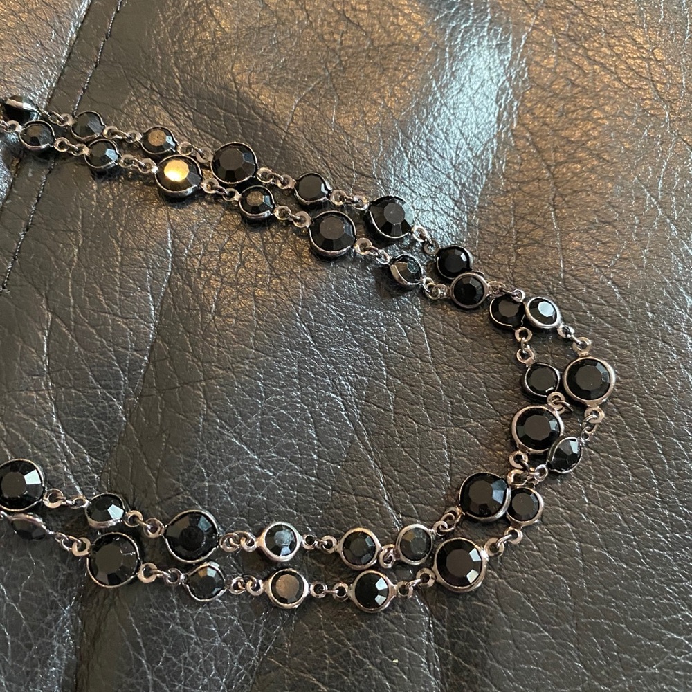 Long black and silver necklaces